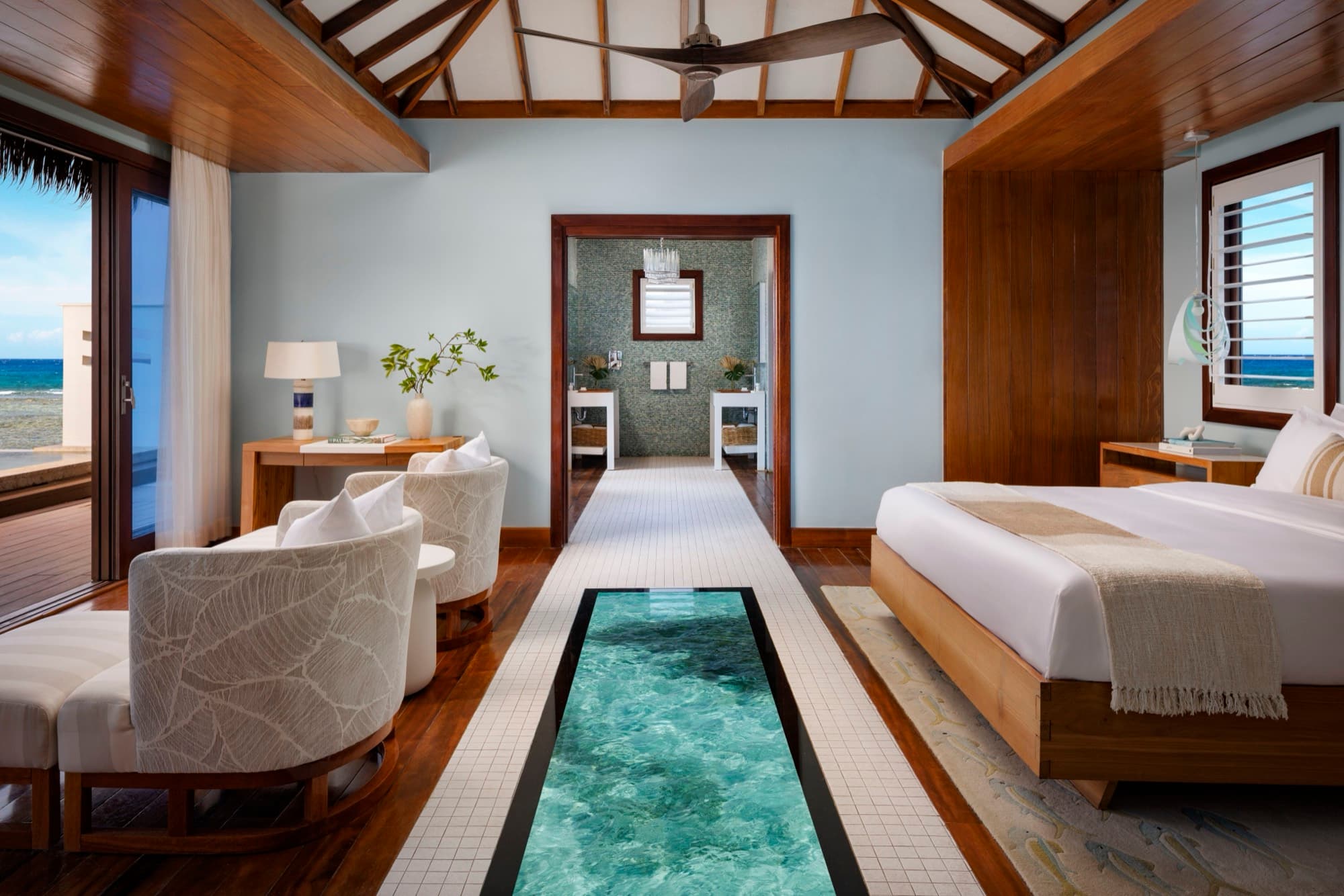 Overwater villa bedroom at Sandals Royal Caribbean
