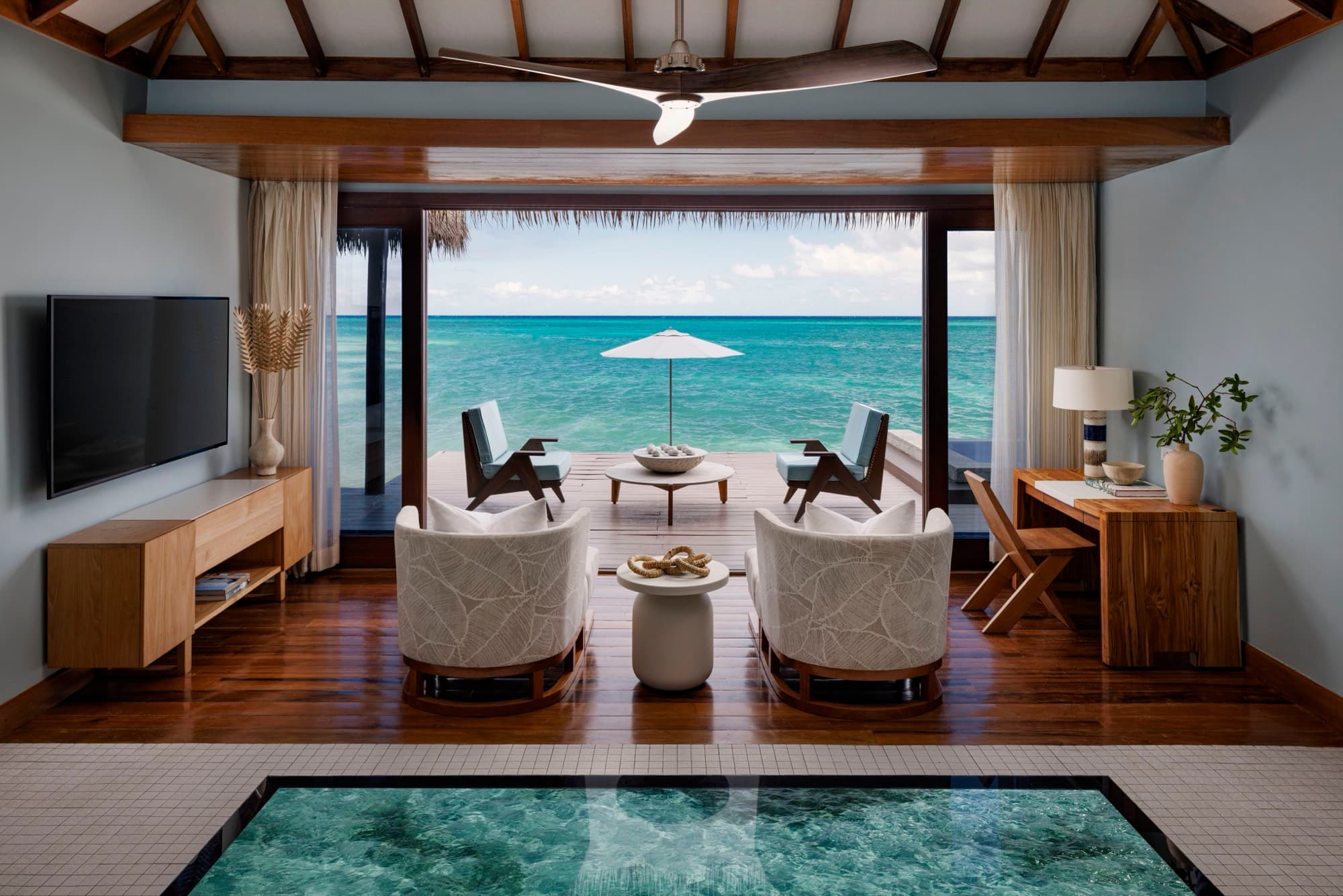 Overwater villa living room at Sandals Royal Caribbean