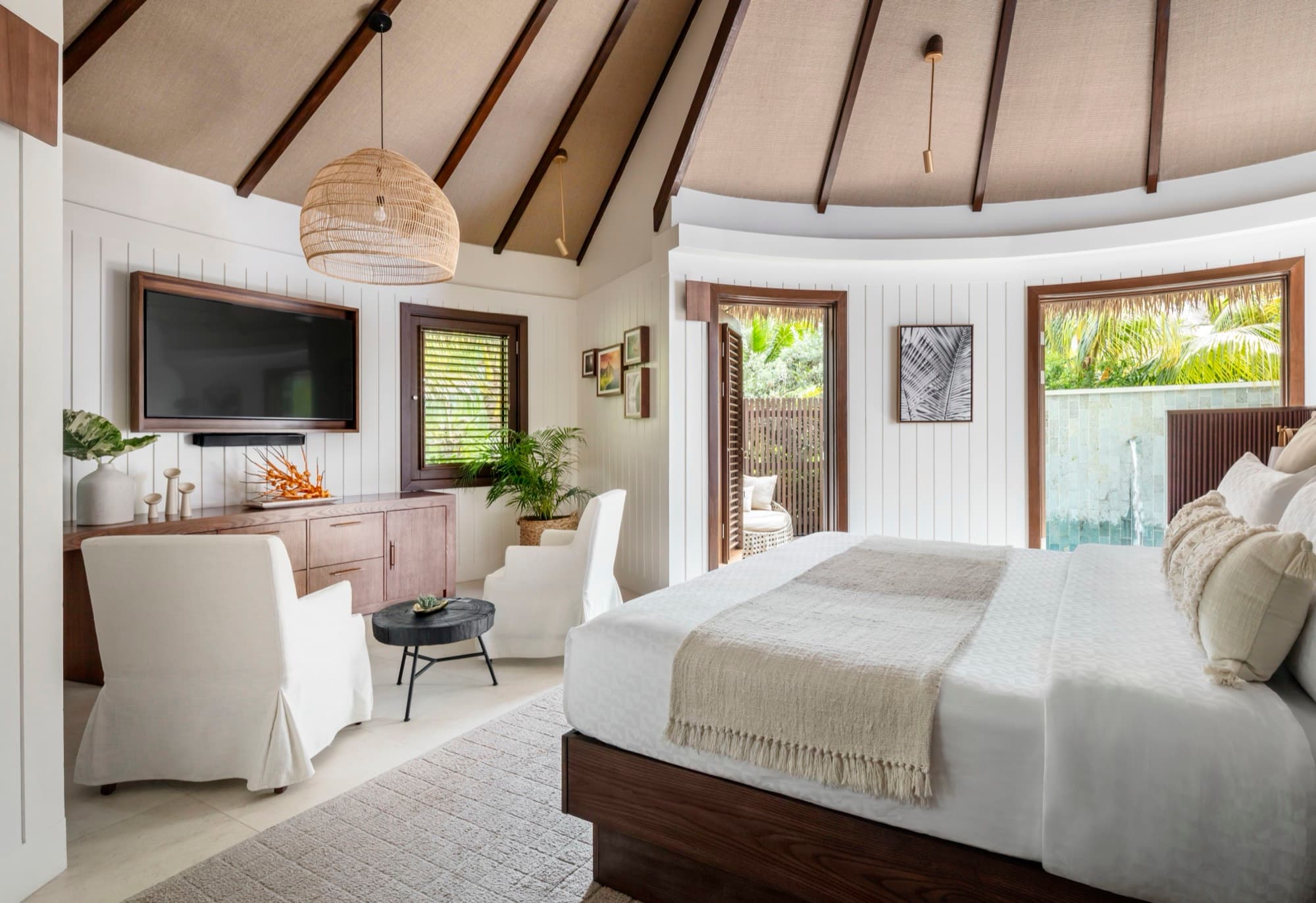 A patio-suite bedroom at Sandals Halcyon Beach