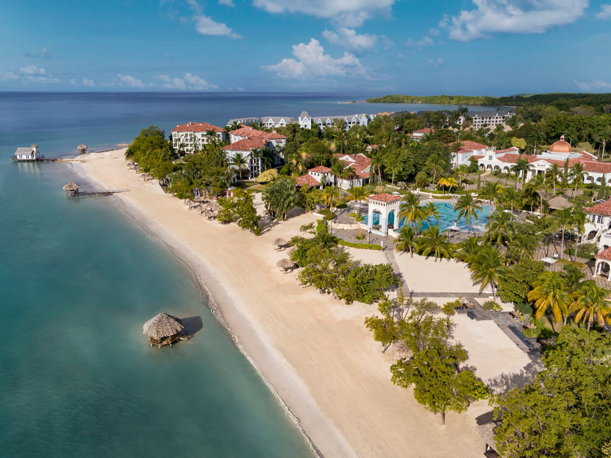 Beach and main pool at Sandals South Coast from above