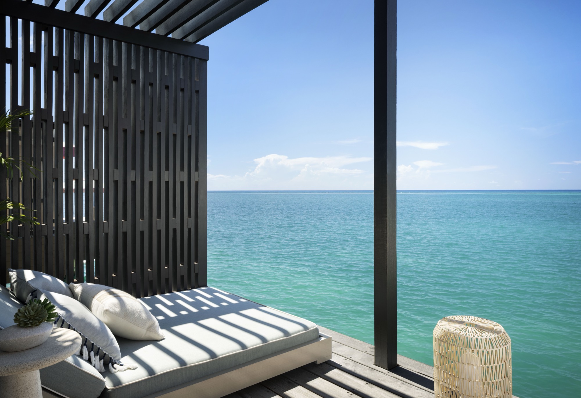 An overwater bungalow deck at Sandals South Coast